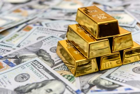 الذهب يربح في ظل ضعف الدولار بفعل توقعات التحفيز الأمريكي