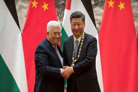 صورة أرشيفية تجمع الرئيس الفلسطيني محمود عباس مع الرئيس الصيني-رويترز الصين تقدم مساعدات لفلسطين بـ15 مليون دولار