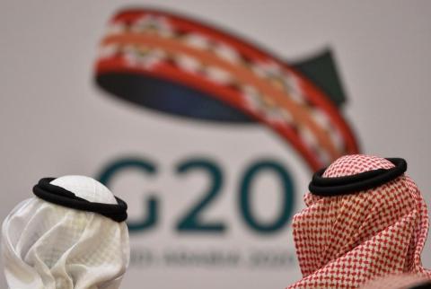 شعار قمة مجموعة العشرين في الرياض 2020-تصوير أ ف ب مجموعة/20 تتفق على إطار عمل للديون لمساعدة الدول الفقيرة