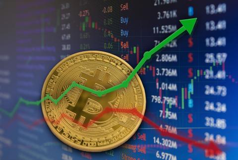 بتكوين تقفز إلى 58 ألف دولار قبل أن تعود إلى 56 ألف دولار