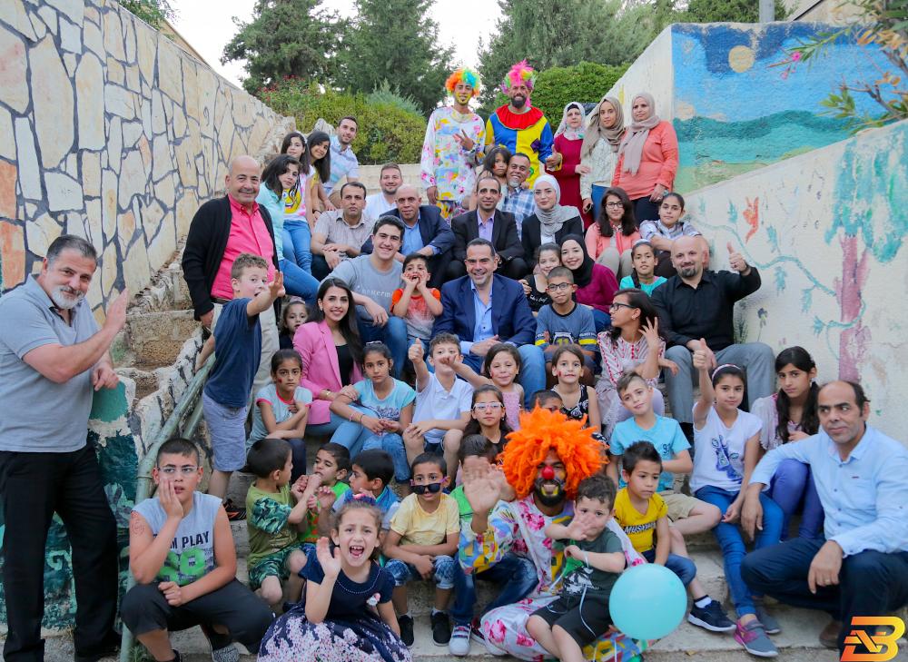 صورة جماعية مع أطفال القرية أيبك تشارك أطفال SOS فرحة الشهر الفضيل