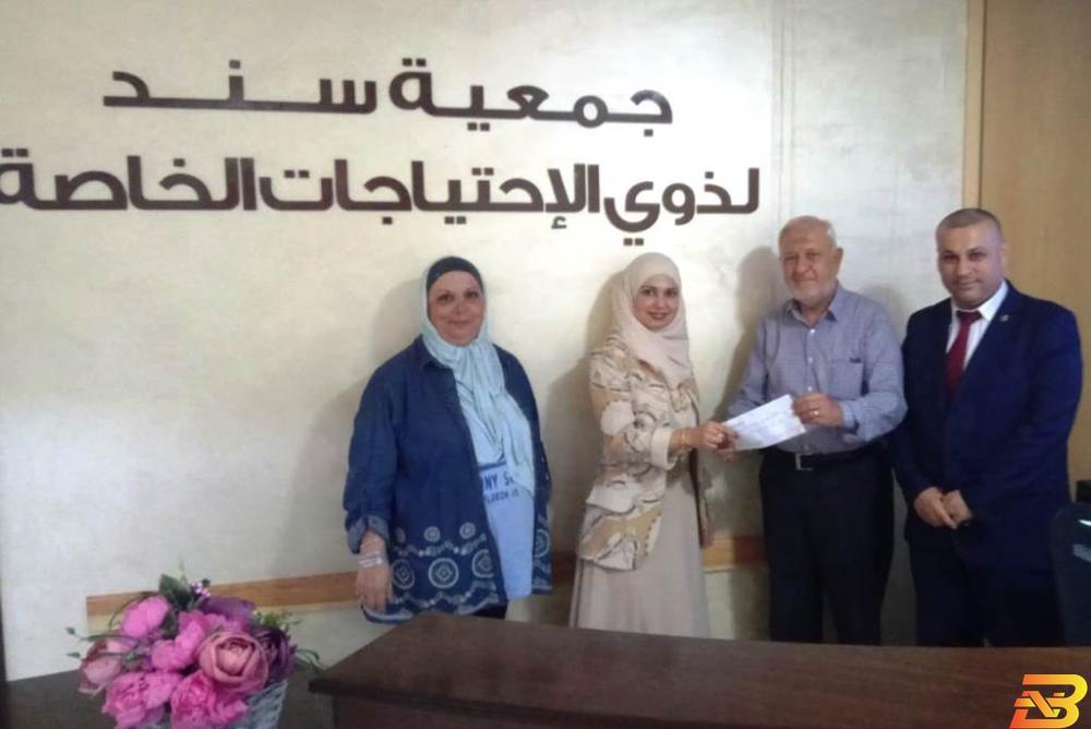 جانب من تسليم الدعم البنك الإسلامي الفلسطيني يدعم جمعية سند لذوي الاحتياجات الخاصة