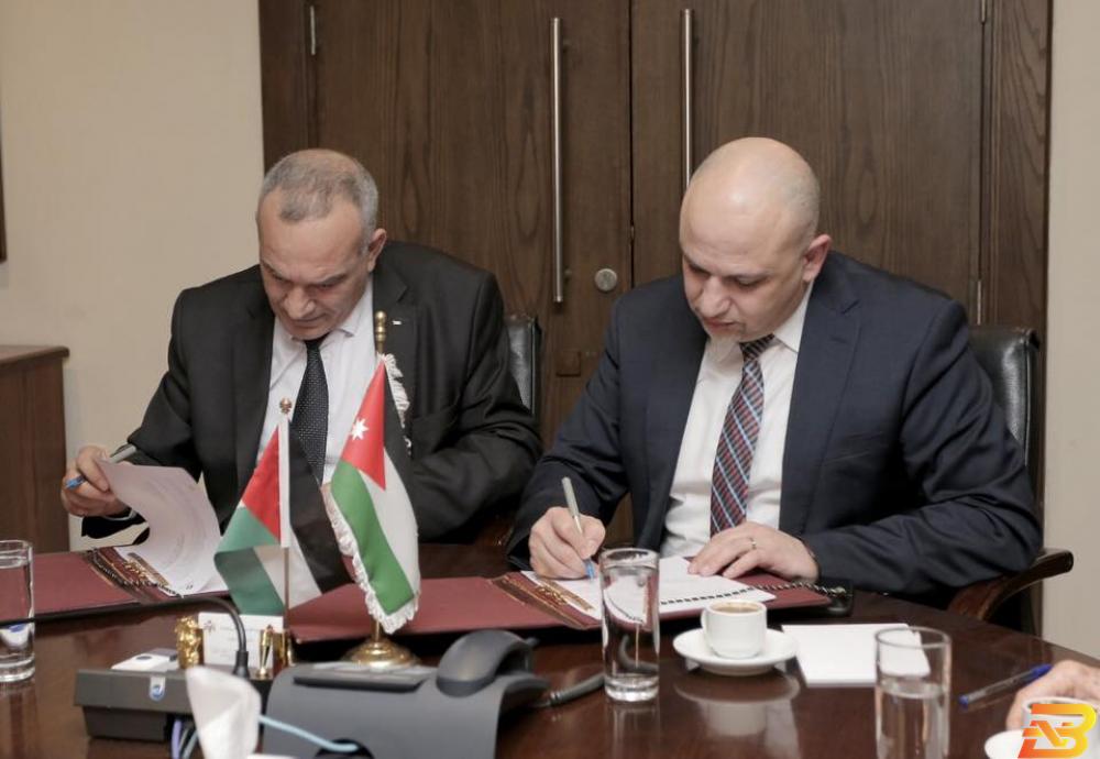 جانب من توقيع مذكرة التعاون مذكرة تعاون بين فلسطين والأردن في مجال الاقتصاد الرقمي