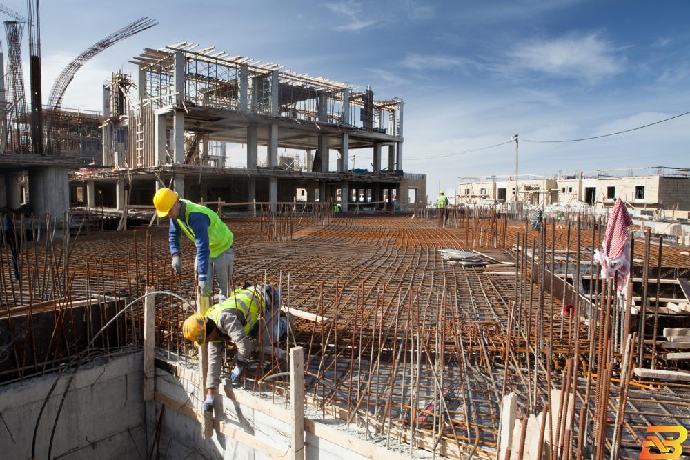 عمال بناء في إحدى الورشات-أرشيف وكالات الإحصاء: انخفاض طفيف على مؤشر أسعار تكاليف البناء في الضفة