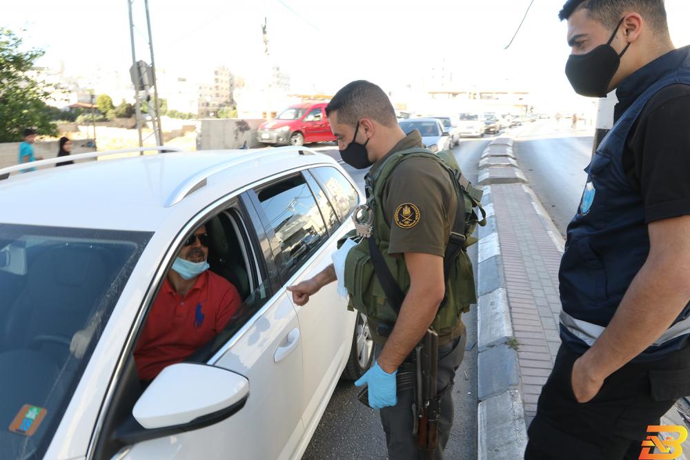 الأجهزة الأمنية تنتشر في الخليل-تصوير وفا محافظ الخليل يقرر تمديد إغلاق المحافظة