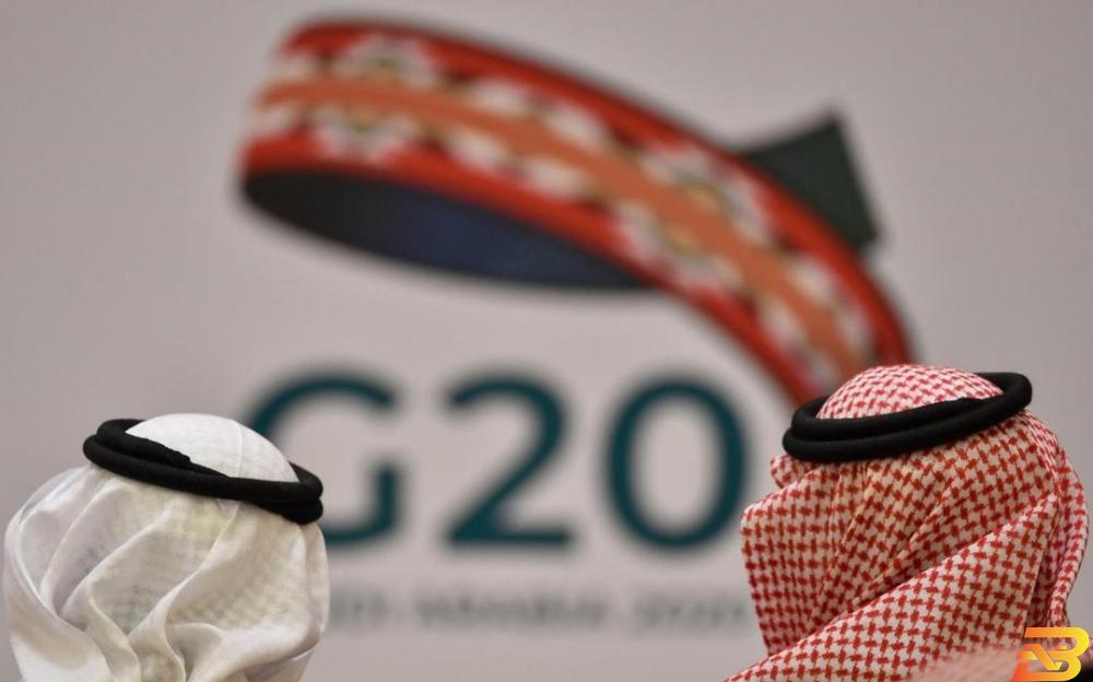 شعار قمة مجموعة العشرين في الرياض 2020-تصوير أ ف ب مجموعة/20 تتفق على إطار عمل للديون لمساعدة الدول الفقيرة