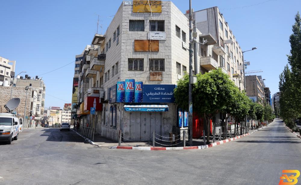 الإغلاق الشامل في مدينة رام الله خلال جائحة كورونا-أرشيف وفا بسبب ’كورونا’-71% من المؤسسات الاقتصادية أغلقت أبوابها لفترات