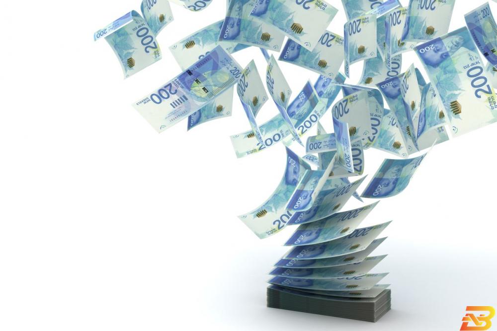 صورة توضيحية-أوراق نقدية من عملة الشيقل الإسرائيلي عجز ميزانية إسرائيل يقفز إلى 11.1% الشهر الماضي